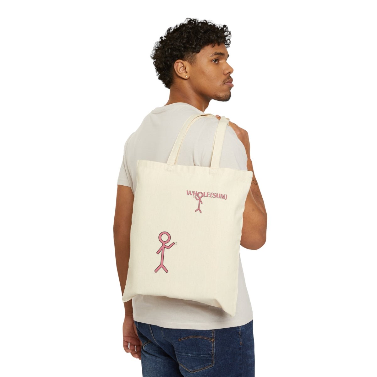 wholesum-wave-tote-bag-held-over-models-shoulder-with-stick-figure-design-showing